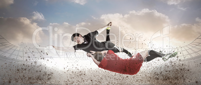 Composite image of a rugby player scoring a try