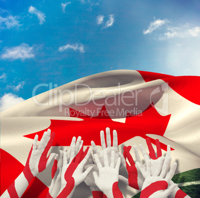 Composite image of people raising hands in the air