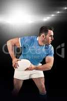 Composite image of rugby player throwing the ball