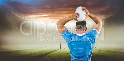 Composite image of rugby player throwing the ball