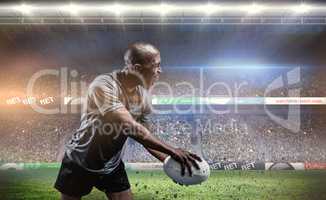 Composite image of sportsman playing rugby