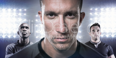 Composite image of close-up portrait of serious rugby player