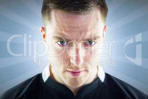 Composite image of a rugby player looking down