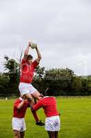 Rugby players jumping for line out