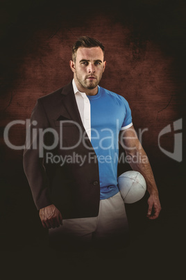 Composite image of rugby player looking at camera