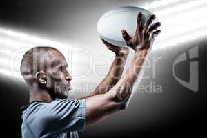 Composite image of athlete in position of throwing rugby ball