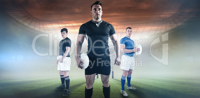 Composite image of rugby player holding rugby ball