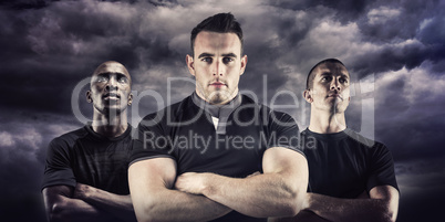 Composite image of tough rugby player looking at camera