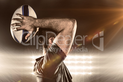 Composite image of rugby player throwing ball