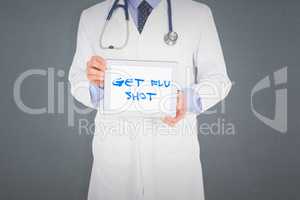 Composite image of doctor showing digital tablet on white backgr