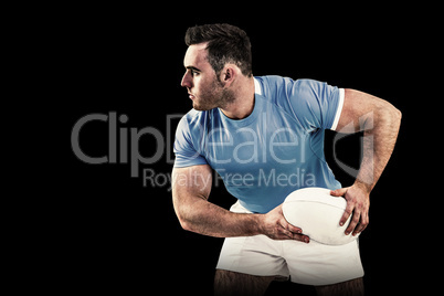 Composite image of rugby player throwing the ball