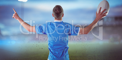 Composite image of rugby player gesturing with hands