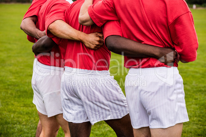 Rugby players standing together before match