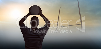 Composite image of rear view of athlete throwing rugby ball