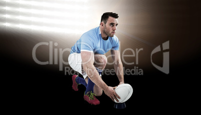 Composite image of rugby player ready to kick