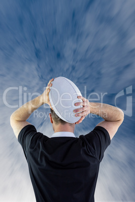 Composite image of rugby player running with the rugby ball