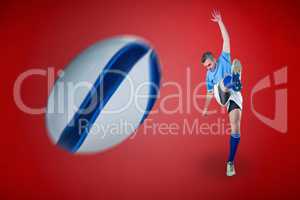 Composite image of rugby player kicking