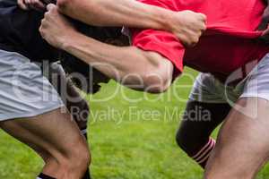 Rugby players doing a scrum