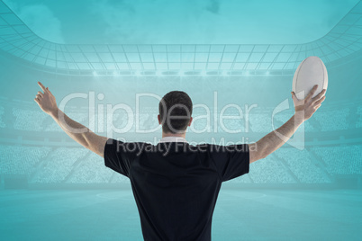 Composite image of rugby player about to throw a rugby ball