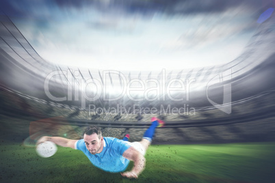Composite image of rugby player scoring a try