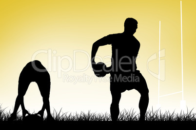 Composite image of rugby player about to throw a rugby ball