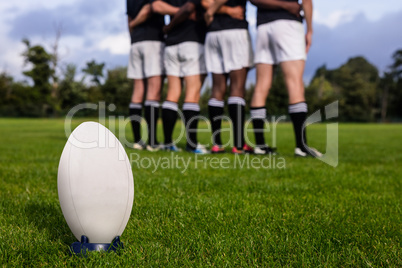 Rugby players standing together before match