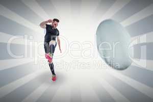 Composite image of rugby player kicking