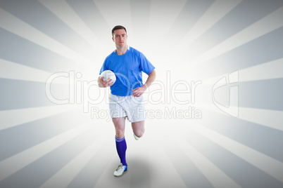 Composite image of rugby player running with the rugby ball