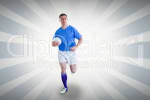 Composite image of rugby player running with the rugby ball