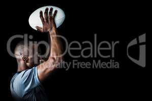 Composite image of rugby player throwing ball
