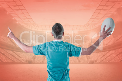 Composite image of rugby player gesturing with hands