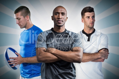 Composite image of tough rugby players Composite image of tough rugby players