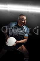 Composite image of sportsman in position to throw rugby ball