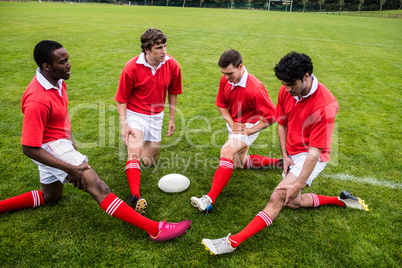Rugby players warming up before match