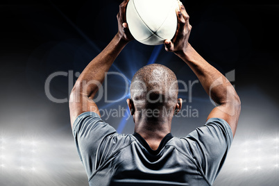 Composite image of sportsman throwing rugby ball