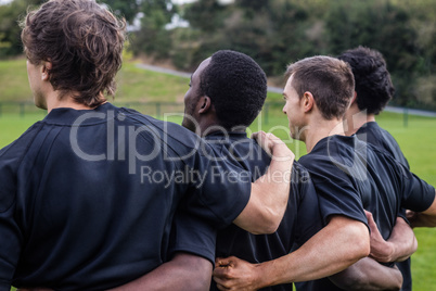 Rugby players standing together before match