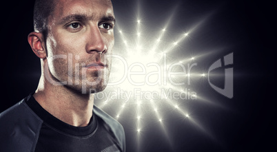 Composite image of close-up of serious rugby player looking away