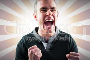 Composite image of excited rugby player yelling out