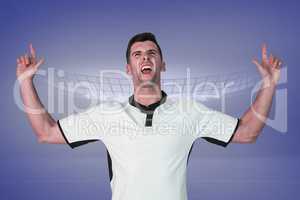 Composite image of excited rugby player pointing up