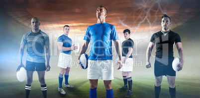 Composite image of portrait of sportsman holding rugby ball while standing