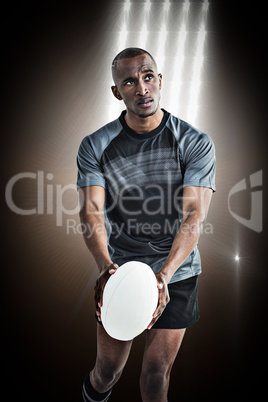 Composite image of athlete throwing rugby ball