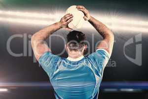 Composite image of rugby player throwing the ball