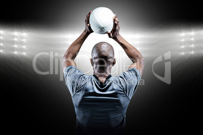 Composite image of athlete throwing rugby ball Composite image of athlete throwing rugby ball