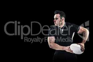 Composite image of rugby player throwing the ball