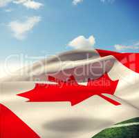 Composite image of low angle view of canadian flag