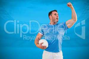 Composite image of rugby player cheering with the ball