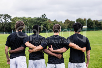 Rugby players standing together before match