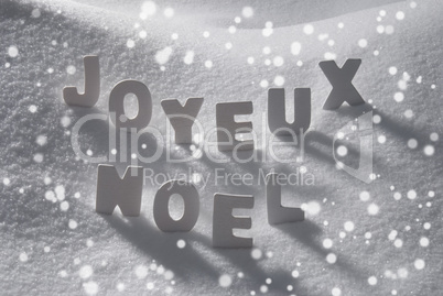 White Word Joyeux Noel Means Merry Christmas On Snow, Snowflakes