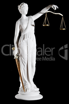 Classic white marble statue of Themis with sword and scales