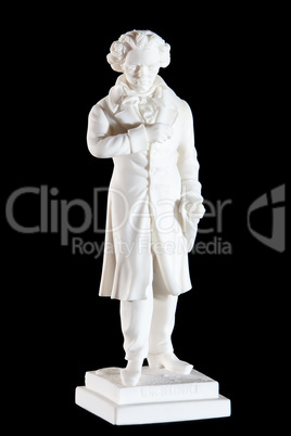 Classic white marble statue of Ludwig van Beethoven isolated on black background